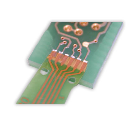 Soldering of a flex foil on a PCB.

Hot Bar Soldering with flat soldering bar. 

The positioning of the flex foil on the soldering pads of the PCB is realised with alignment pins and corresponding drillings in flex and PCB.