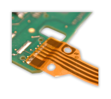 Soldering of a flex foil on a PCB.

Hot Bar Soldering with flat soldering bar. 

The positioning of the flex foil on the soldering pads of the PCB is realised with alignment pins and drillings in flex and PCB.