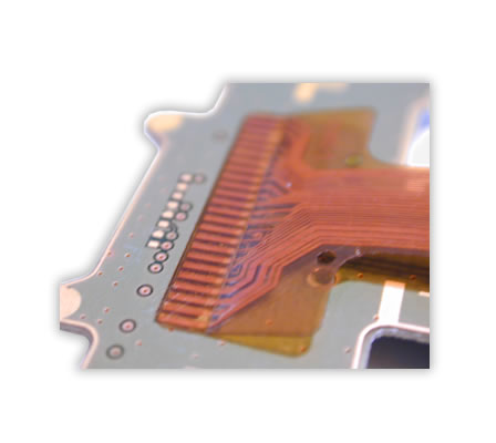 Soldering of a flex foil on a PCB.

Hot Bar Soldering with flat soldering bar. 

The positioning of the flex foil on the soldering pads of the PCB is realised with alignment pins and corresponding drillings in flex and PCB.